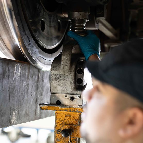 A technician works on a testing device